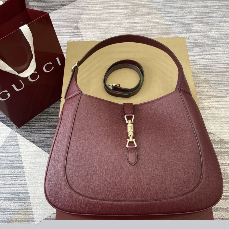 G*u*i top handle bags